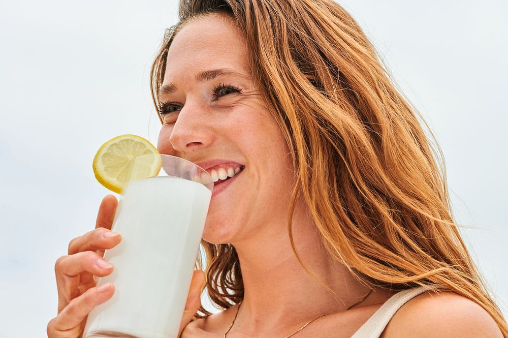 Customer sipping lemon water with Sea Moss Gel